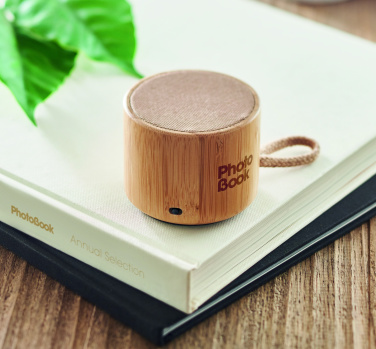 Logotrade promotional item image of: Round bamboo wireless speaker