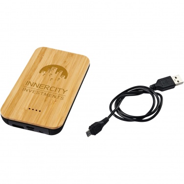 Logotrade reklamprodukter bild: Framtida bambu/tyg 6 000 mAh trådlös powerbank